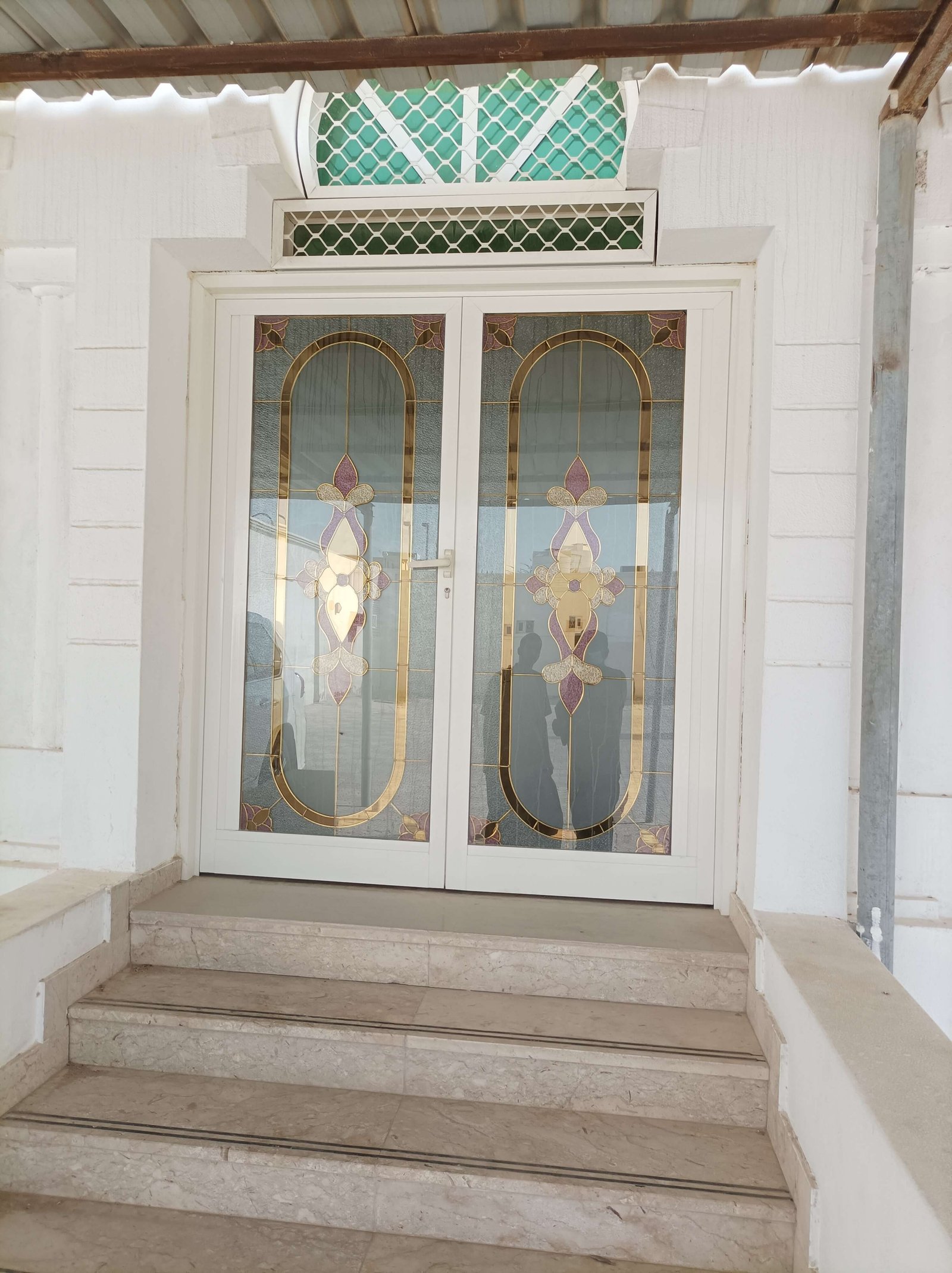 Glass and aluminium door service by Gulf Light in Abu Dhabi